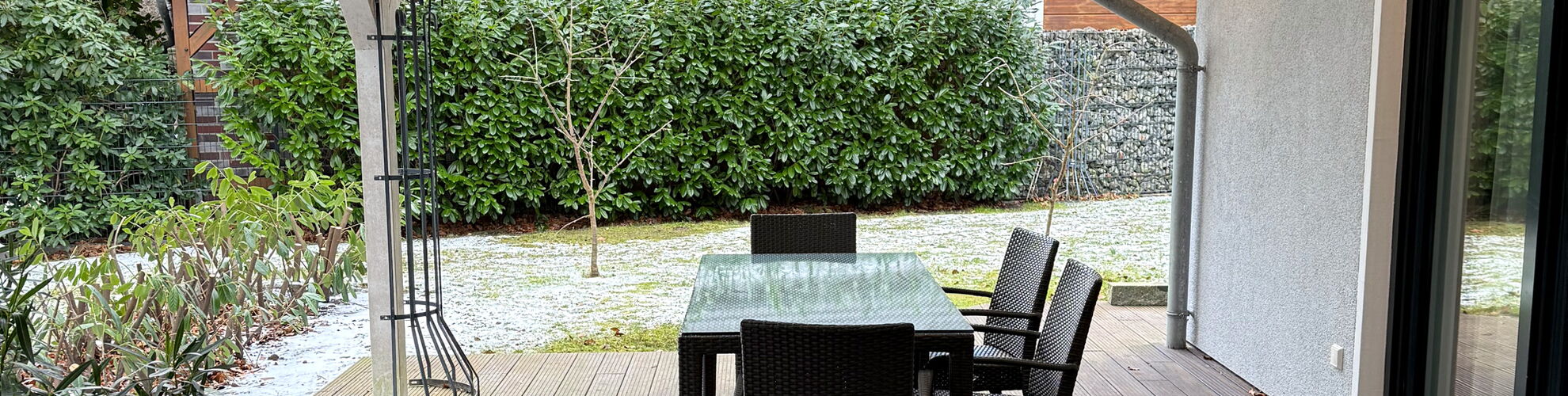 Wohnzimmer mit Sofa im Ferienhaus Graalibu in Graal-Müritz